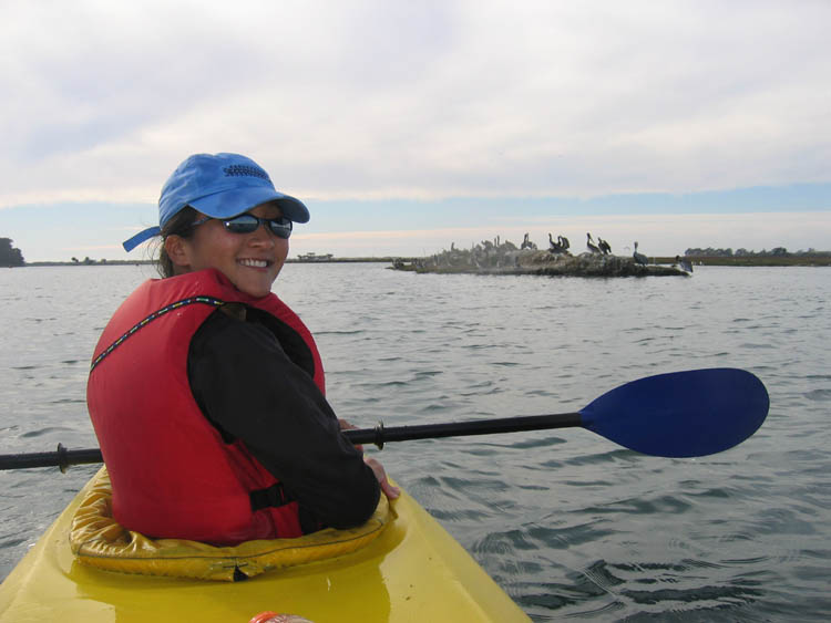 Melinda in front of the Pelicans of Elkhorn